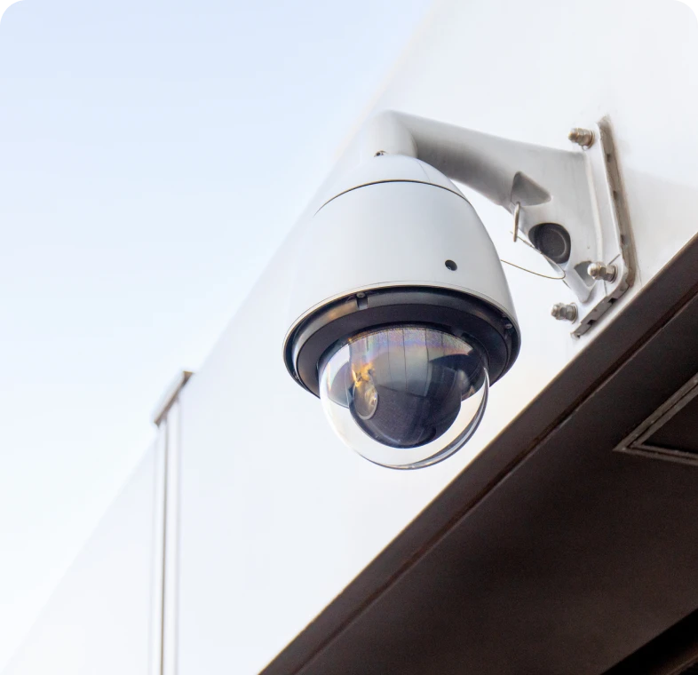 Outdoor surveillance camera on building