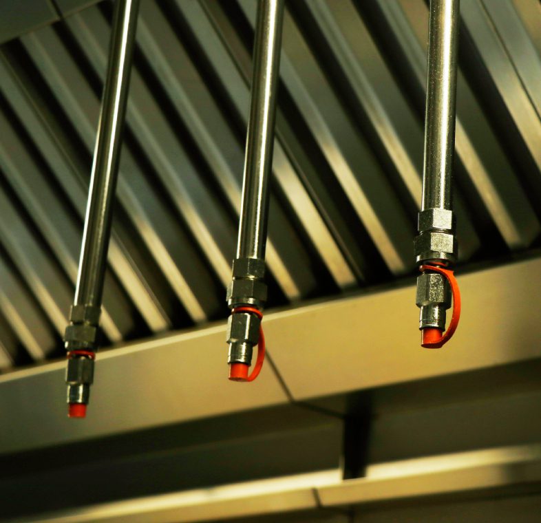 Commercial kitchen hood fire suppression nozzles