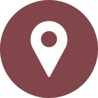 White location pin icon on maroon circle